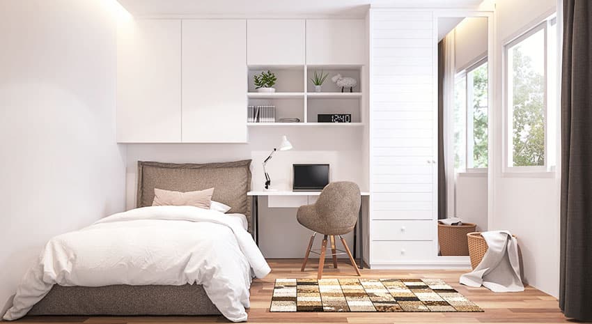 A bed with study and deck in the bedroom 