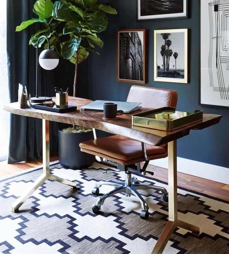 Black and beige pattern rug in a office room