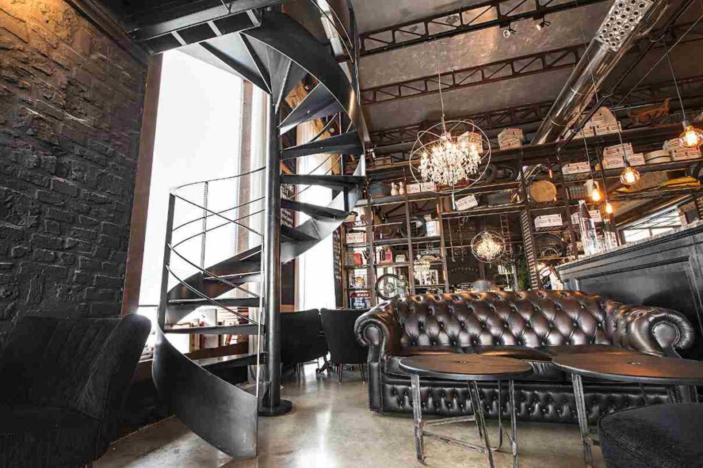 A steampunk house with wooden floor and black stair