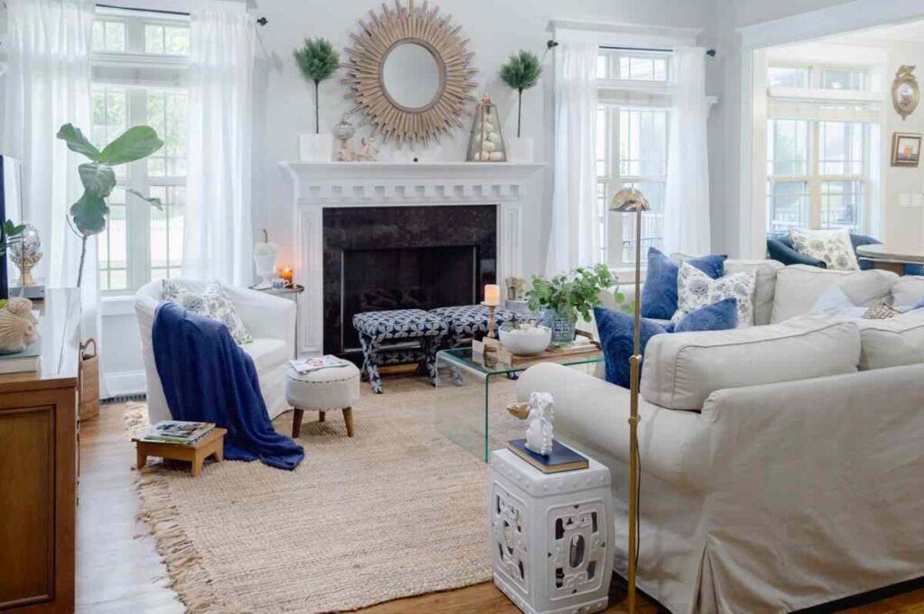 A living room with jute rug and fireplace in the room
