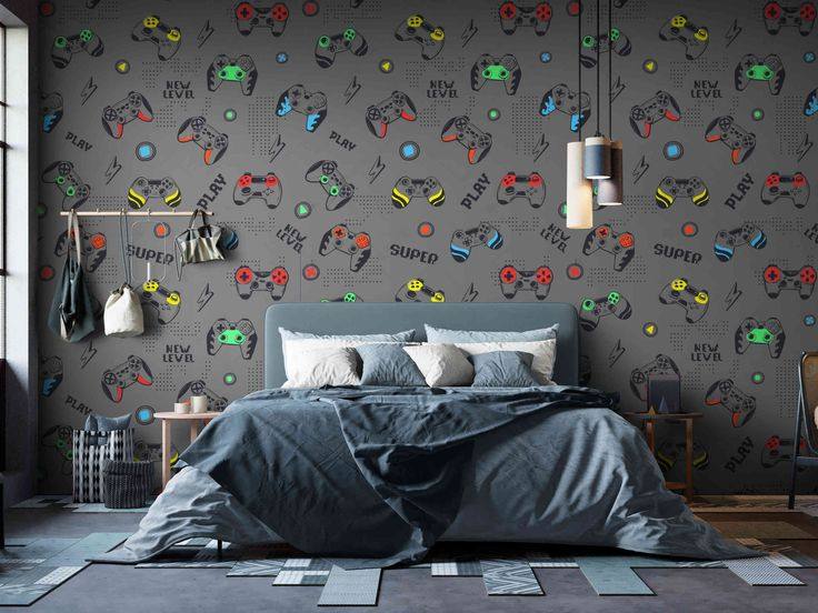 A bedroom with wall paper and grey blanket with pillow