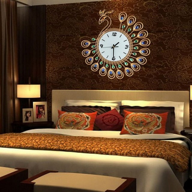 A bedroom with wall clock and lamp on the nightstand 