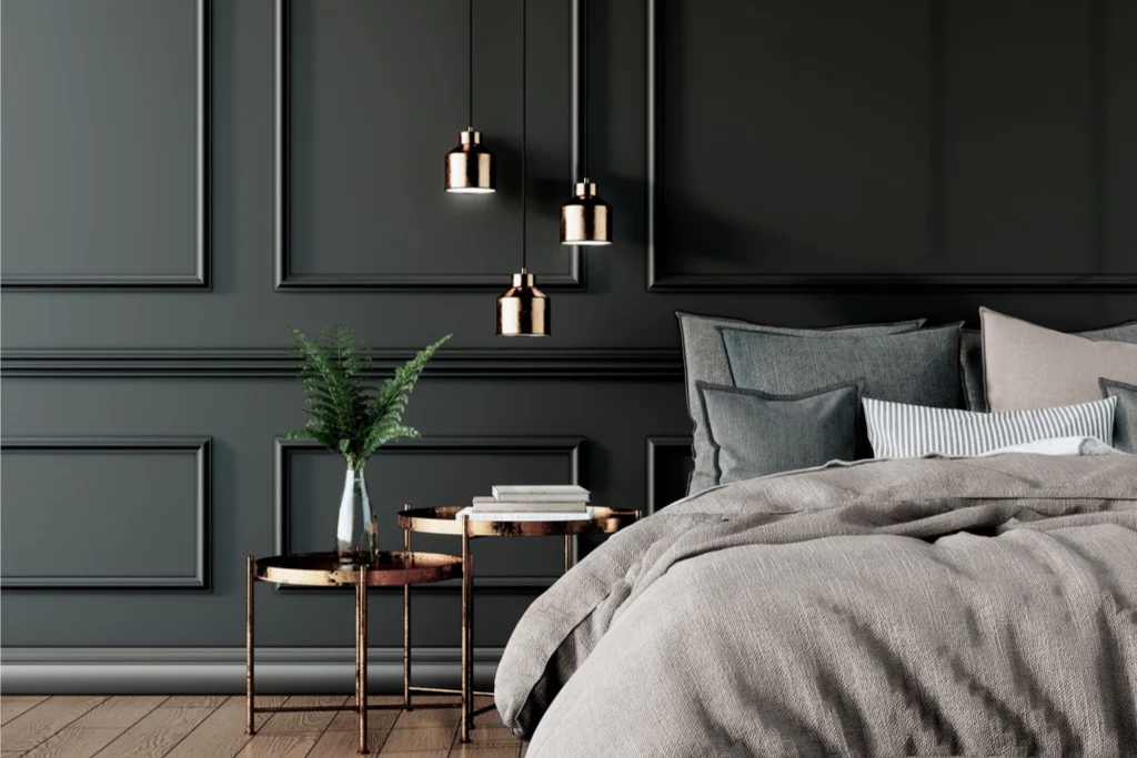 Two bed side table and grey colored wall