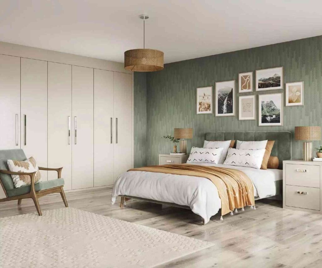 A bedroom with beige and wooden floor and frames on the wall