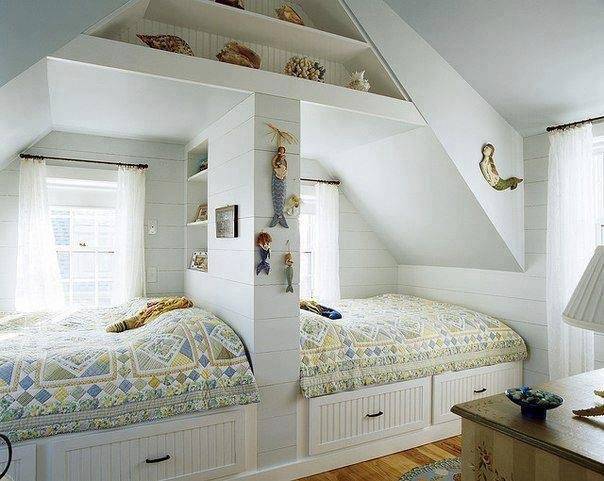 A bedroom on opposite side and wooden floor and side table 