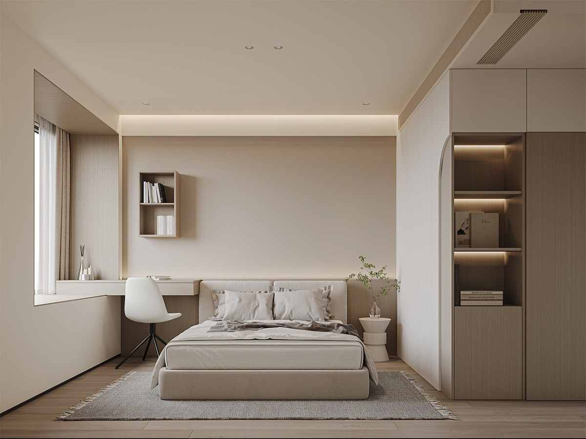 A beige bedroom with open shelves and chair and rug on the wooden floor 