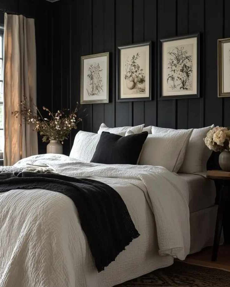 A bedroom with black framed wall 