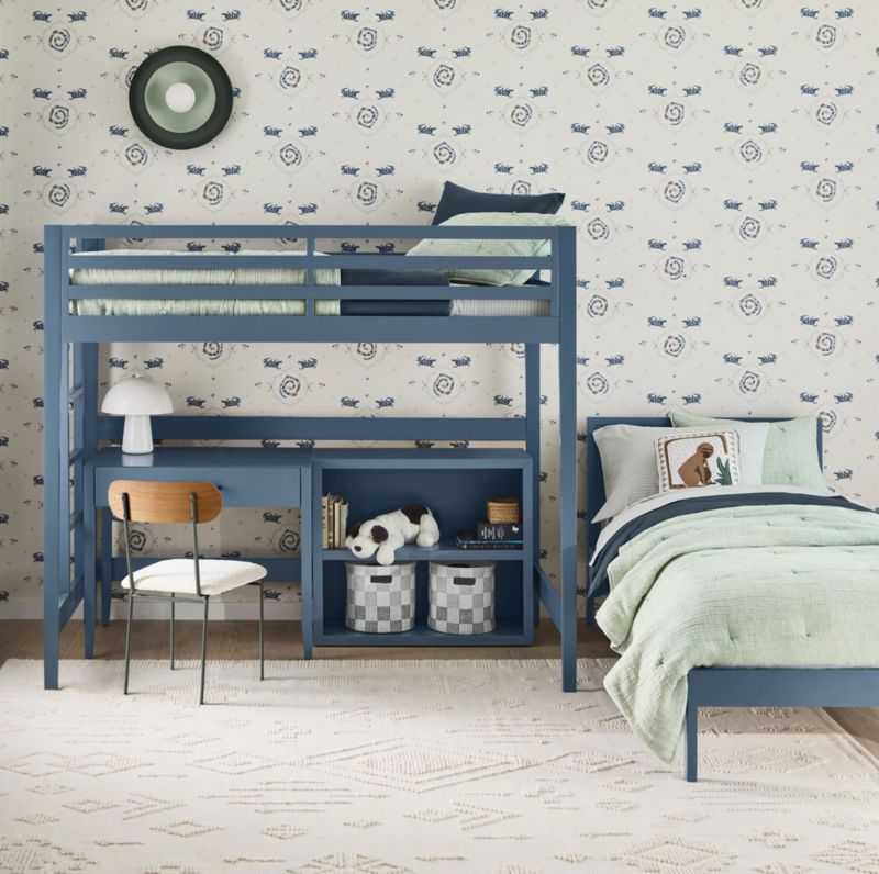 A blue beds in the room and white floor with study deck