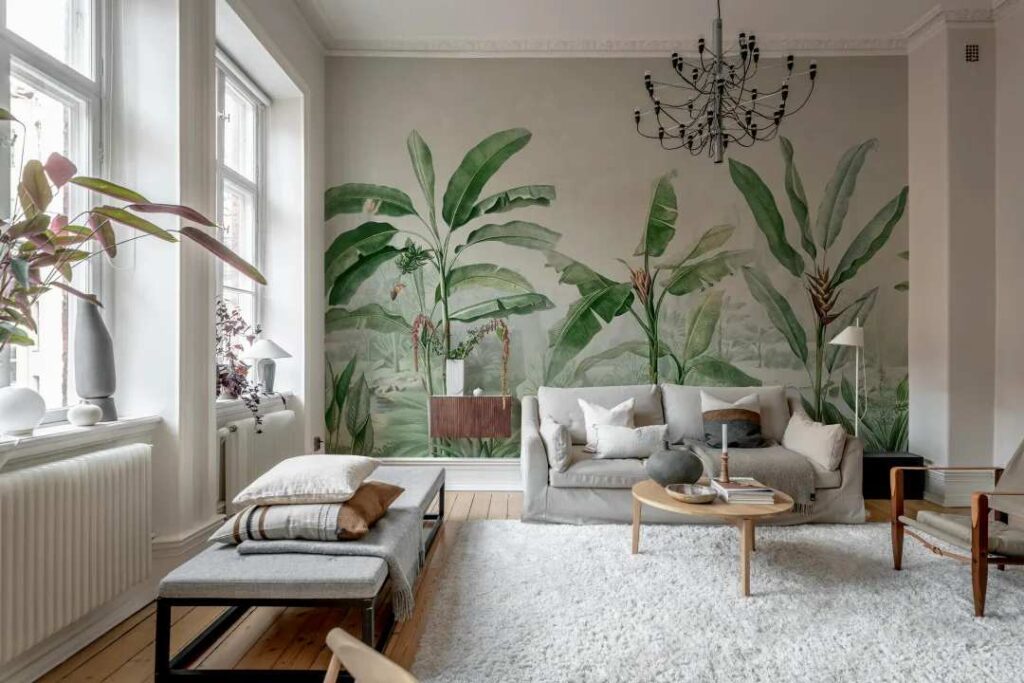A living room with stick wallpaper and and sofa with table and rug on the floor