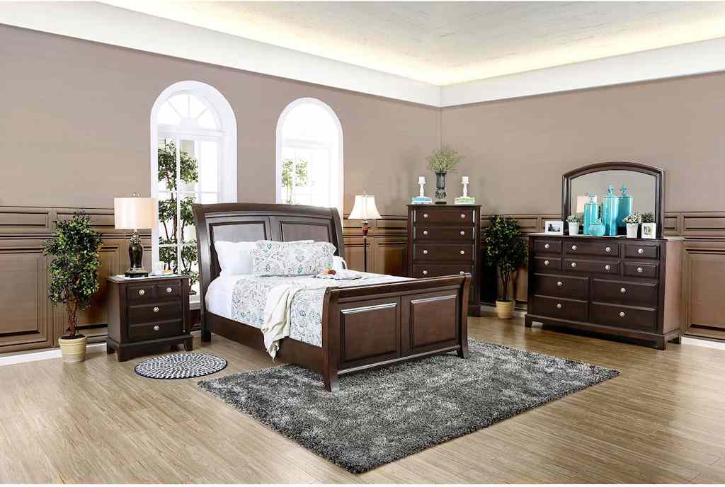 A brown bedroom with dresser and wooden floor and rug on the floor