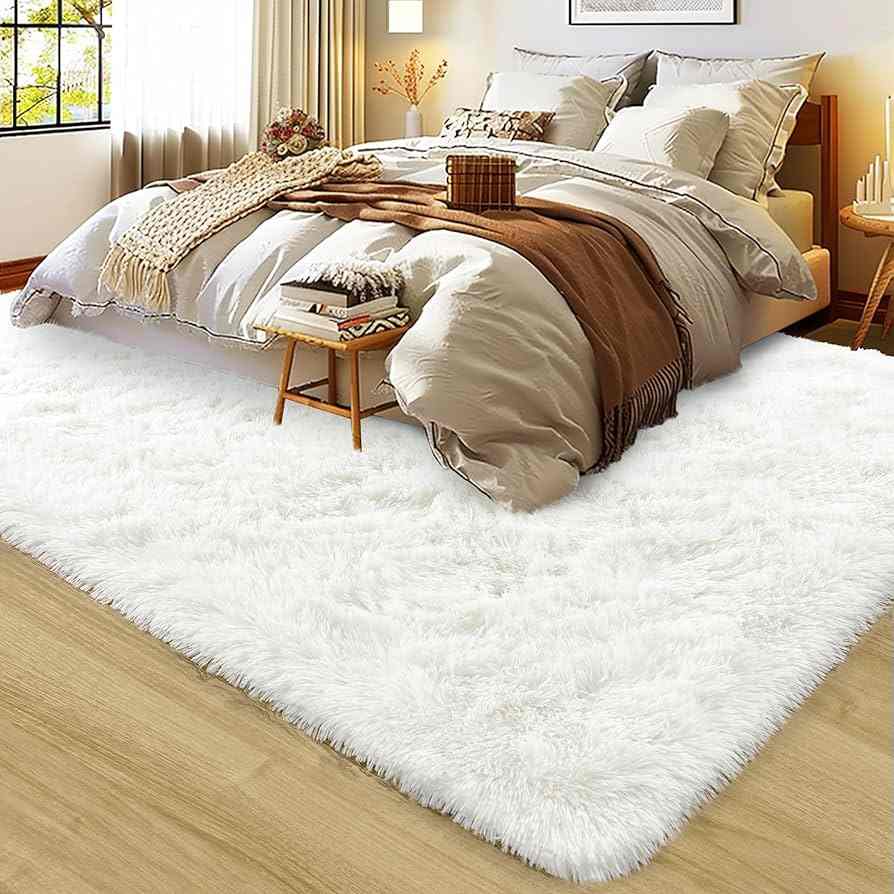 A bedroom with faux fur on wooden floor