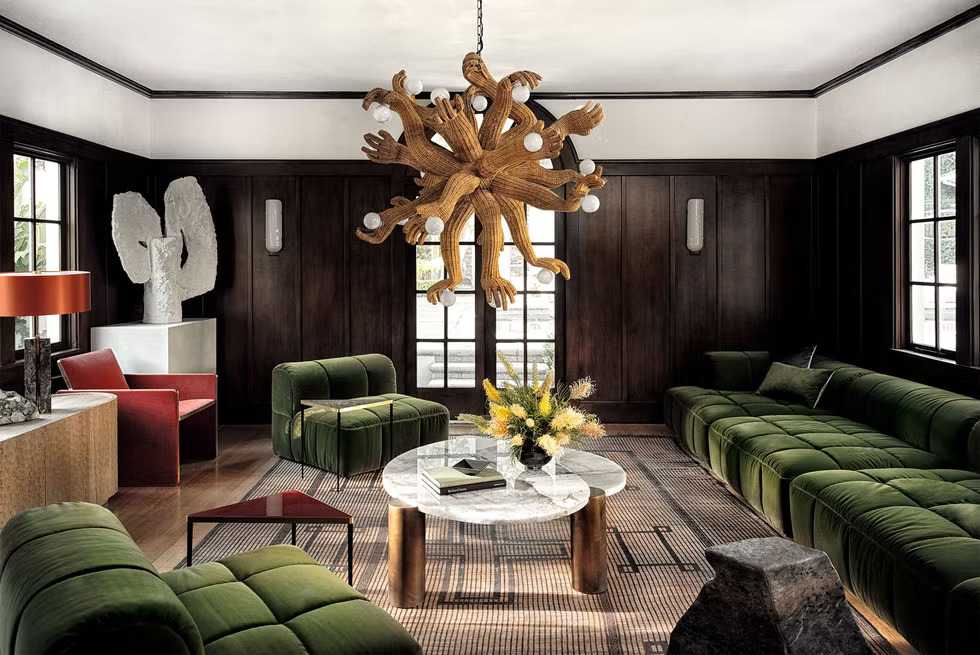 A brown and green living room with rug on the floor