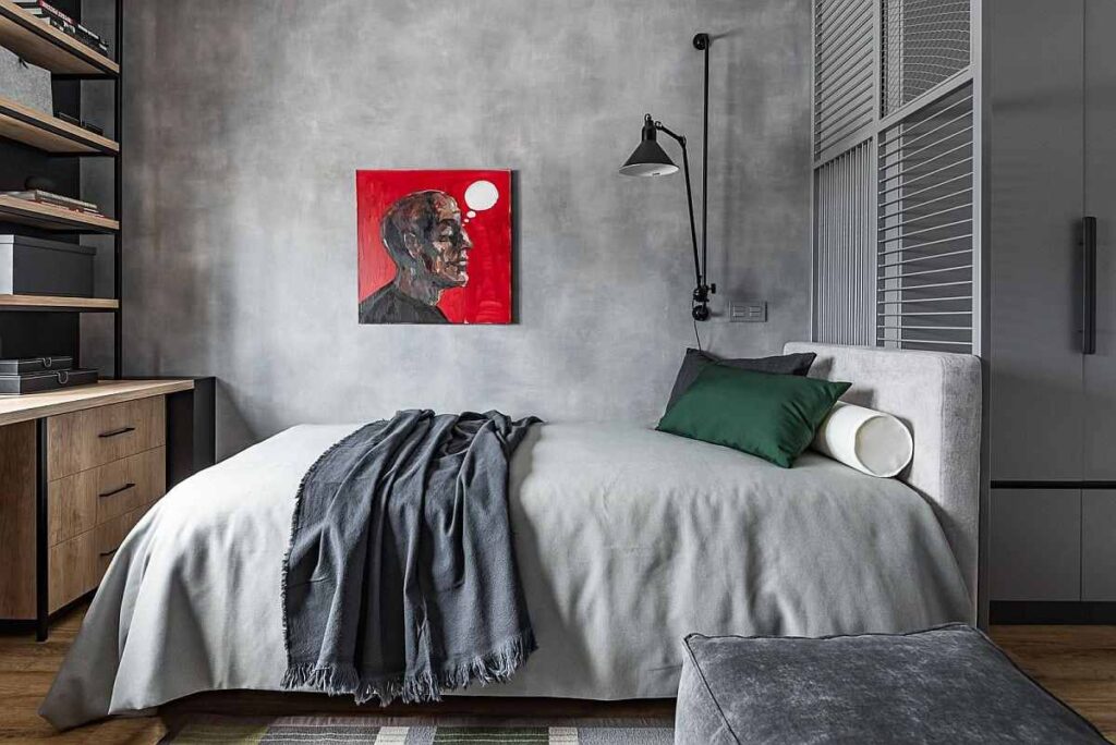 grey-industrial-bedroom-with-rustic-timber-furniture with a painting on wall