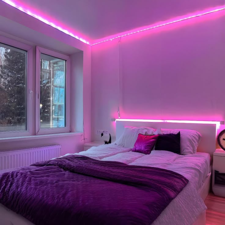 A pink bedroom with led strips and bed and side table and windows