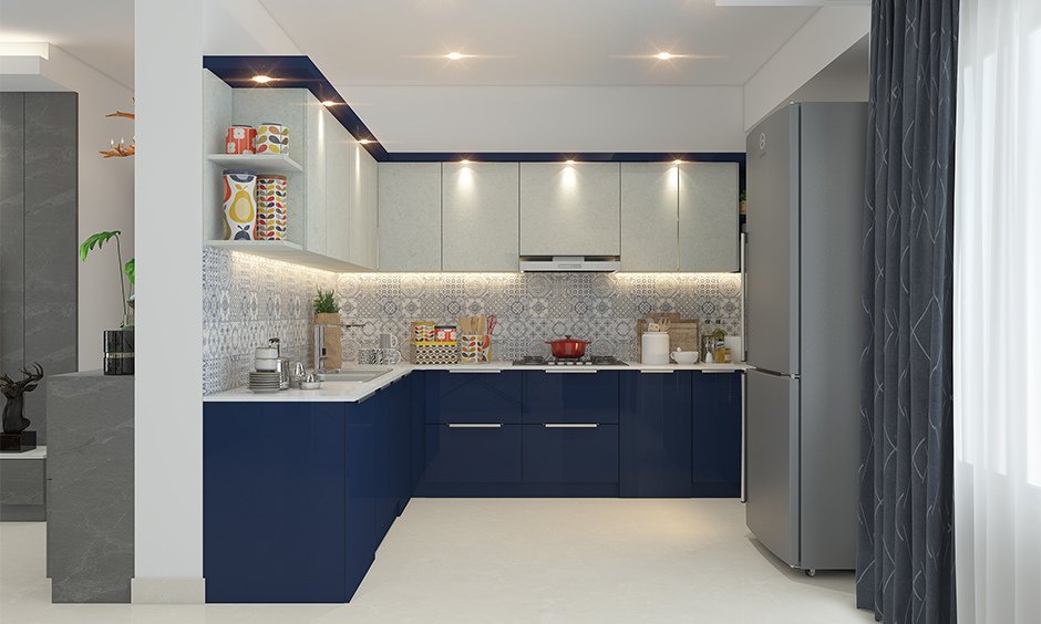 A navy blue kitchen with blue cabinets and white floor