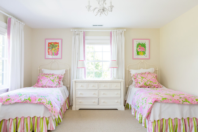A preppy rooms and bed and windows in the room