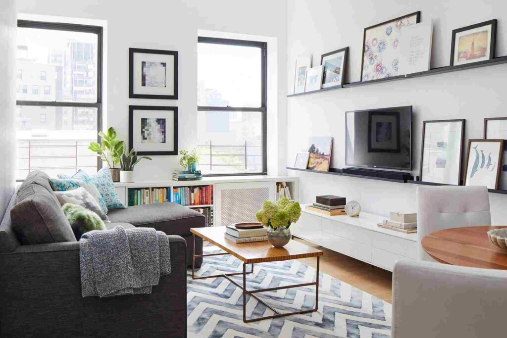A small living room with storage and narrow tv stand