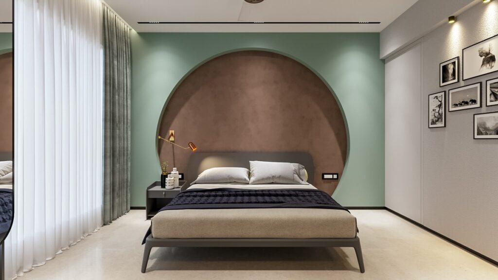 A sage green bedroom with brown accents and grey