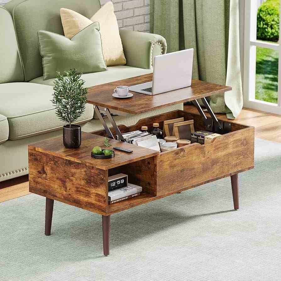 A small living room with storage table and laptop on the table