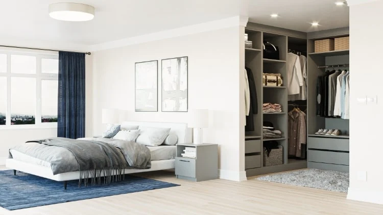 A bedroom with walk-in wardrobe and windows and blue curtains and wooden floor