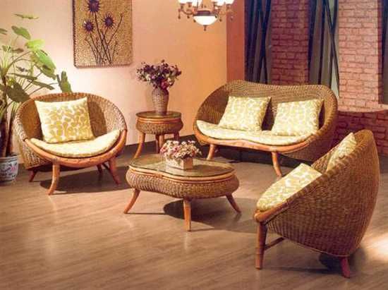 A wicker and rattan furniture in living room with wooden floor