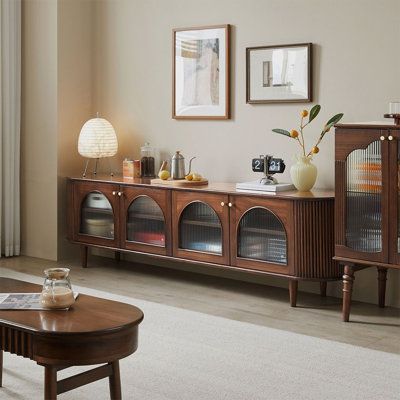 A wood credenzas for storage with white floor