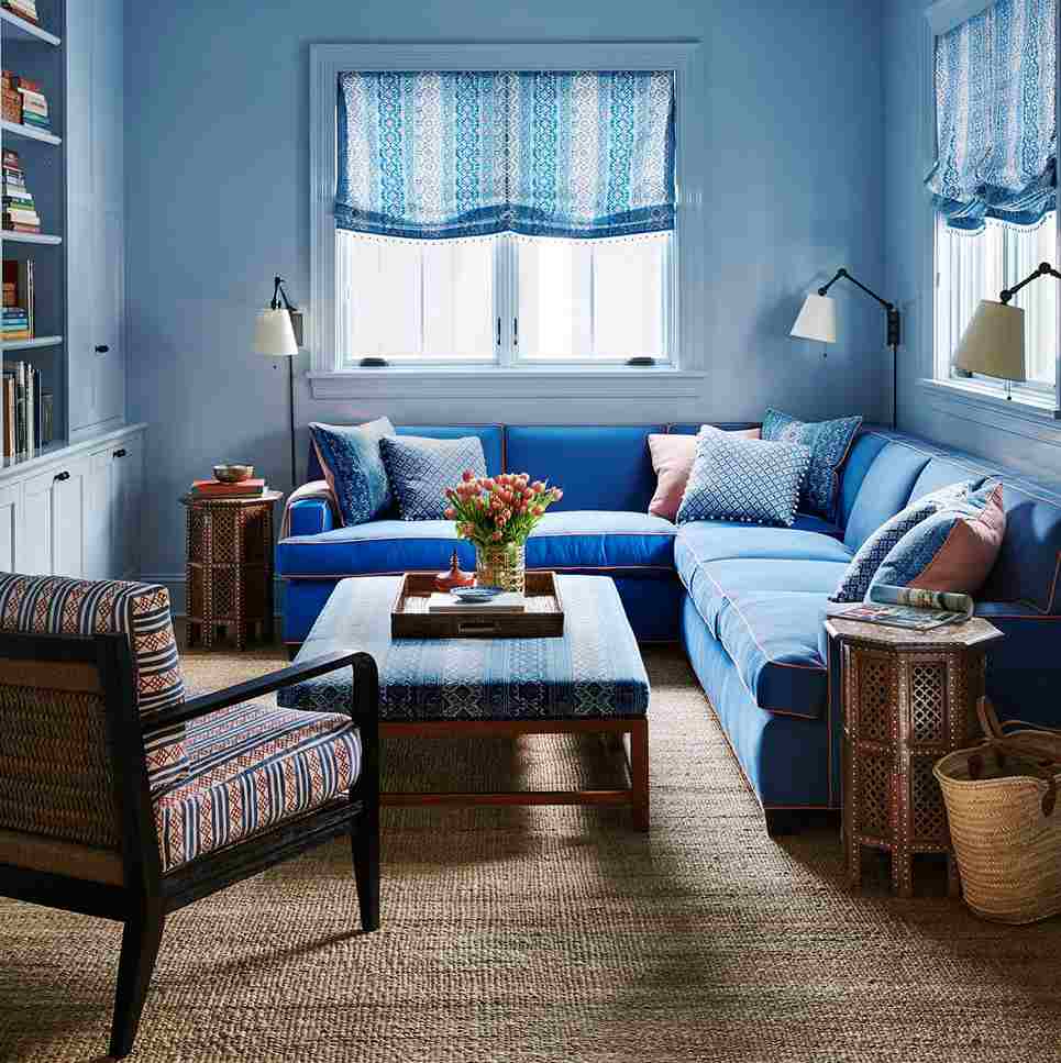 A navy and blue hue and white windows and lamp on the corner