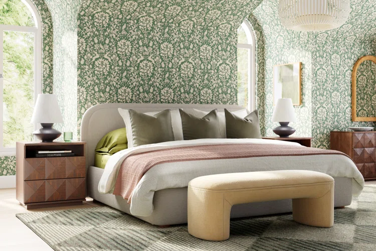 A olive green bedroom with bed and wooden nightstand on the side 
