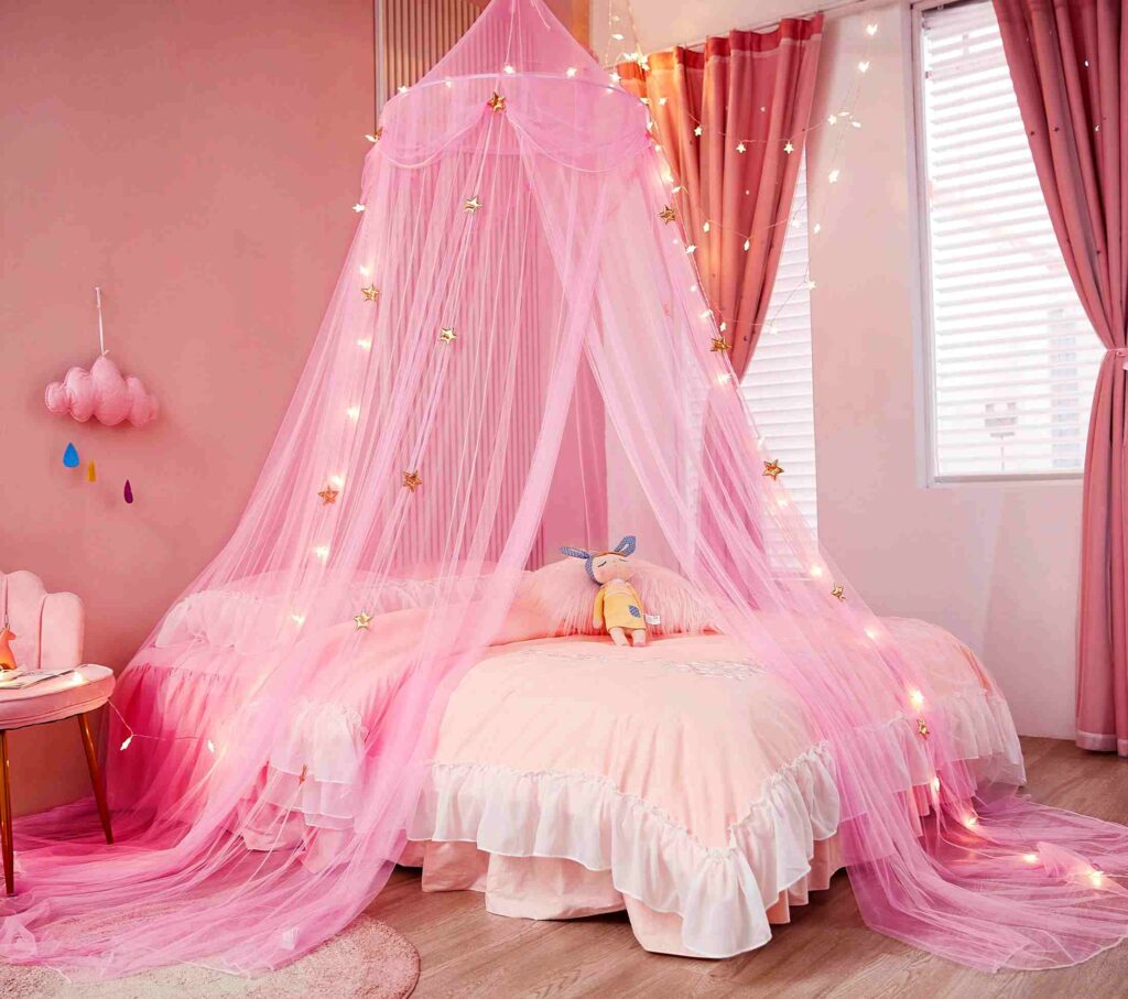 A pink bedroom with pink canopy and pink curtains