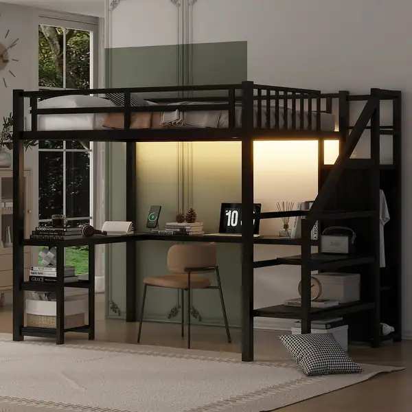 A black loft bed with wooden floor and rug and study table under the loft bed