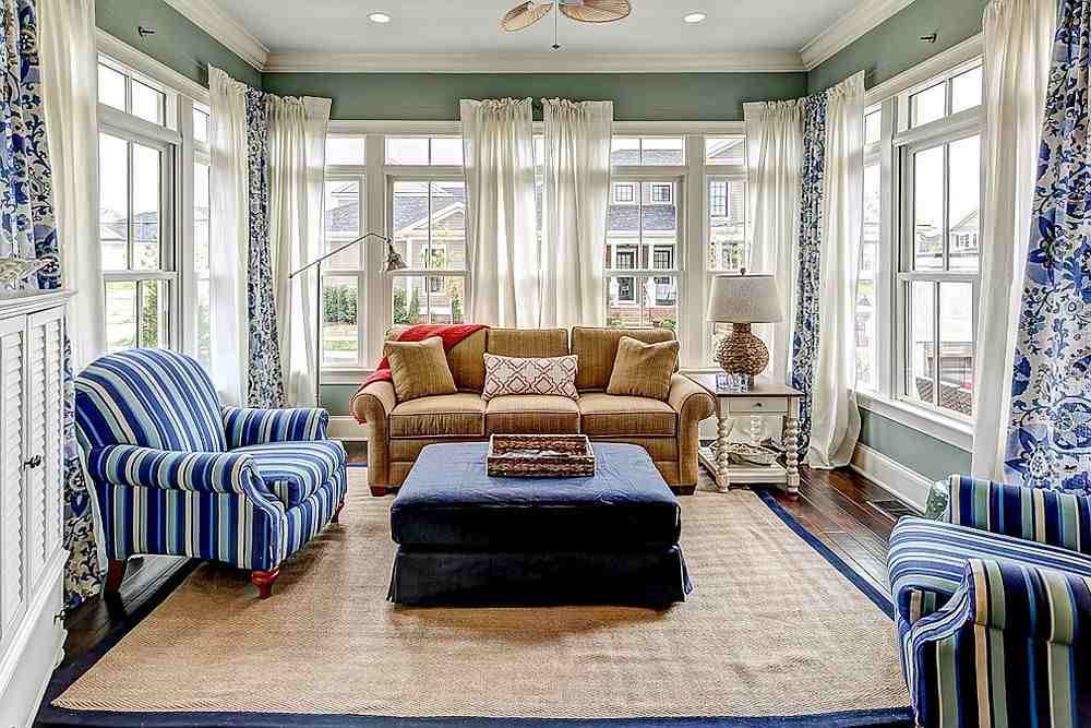 A blue sofa and white glass living room and wooden floor 