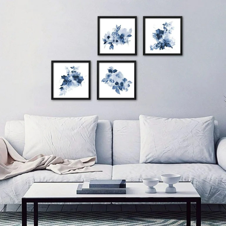 A grey living room with frames on the wall