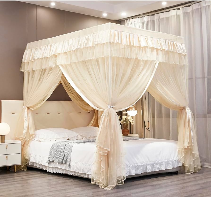 A cozy bedroom with beige canopy bed with drapes and lights above the wall