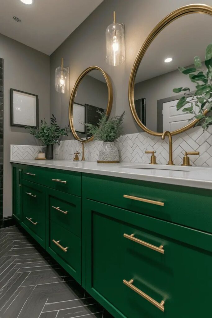 A dark green vanity with mirror on the wall and gold fixtures