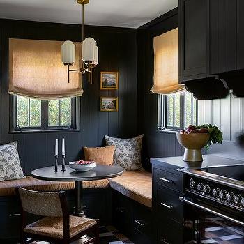 A black and gold breakfast nook in kitchen 