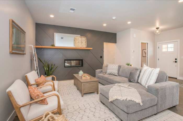 Grey living room with sofa and wooden table and