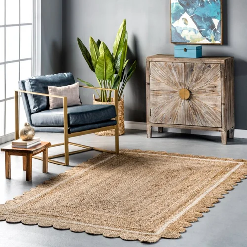 A grey living room with jute rug on the floor 