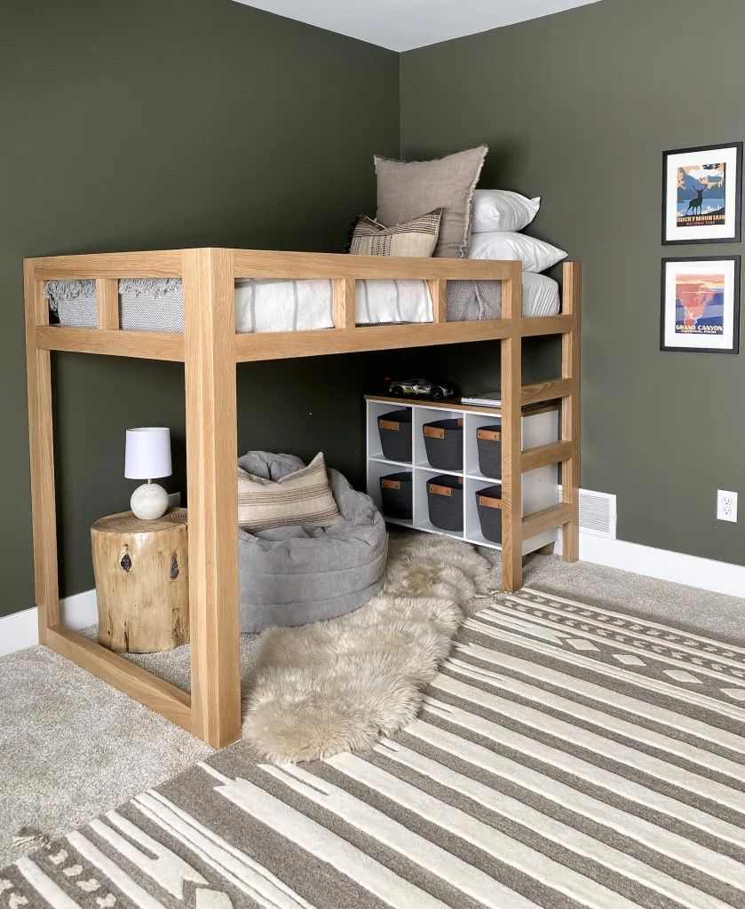 A wooden loft bed with rug on the floor 