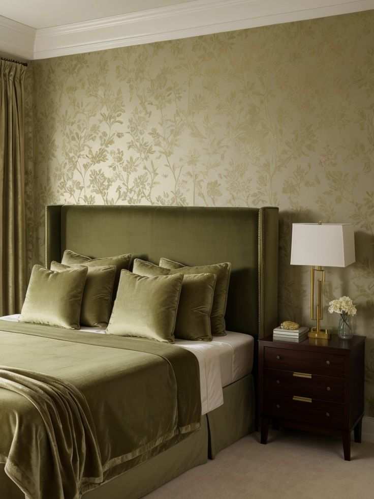 A bedroom with olive velvet headboard cushion on bed