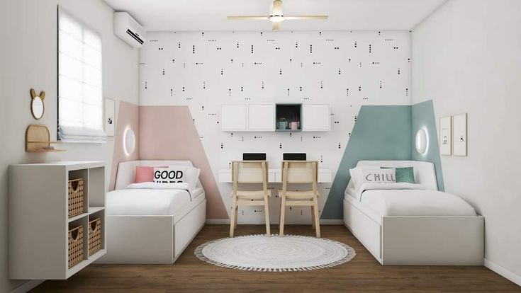 A pink and sea ree wall with twin beds in a bedroom with study  table 