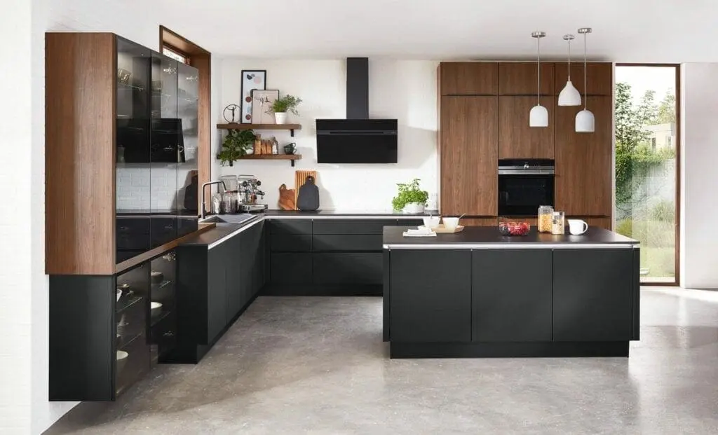 A black brown kitchen and white floor and hang lights above the wall 