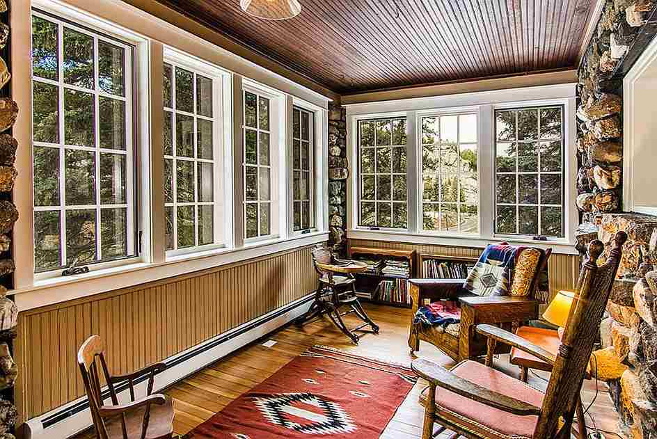 A wooden accent sunroom and wooden floor 